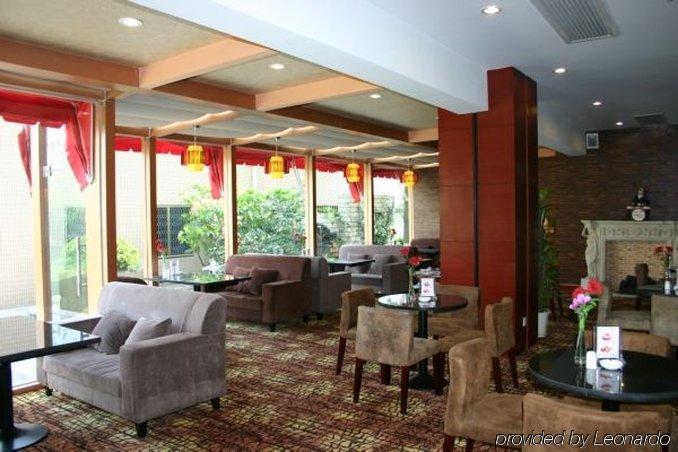 Suzhou Taoyuan International Holiday Hotel Ресторант снимка