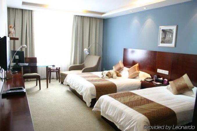 Suzhou Taoyuan International Holiday Hotel Стая снимка